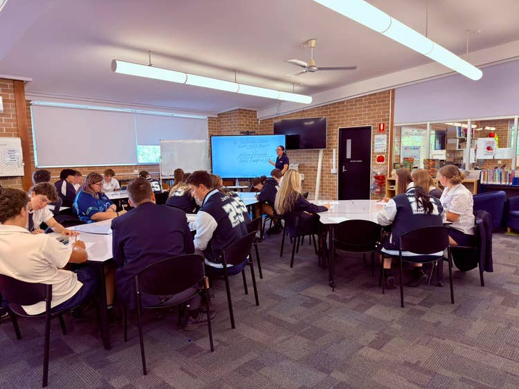 Sr students working in the library